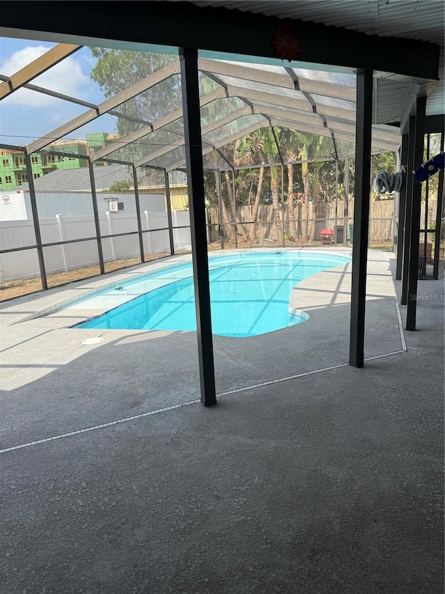 2026 Aaron Pl, Clearwater, FL 33760 - view of pool featuring a fenced backyard, a patio area, and a lanai