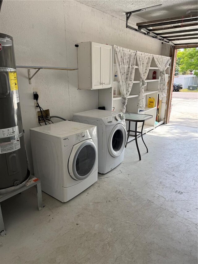 2026 Aaron Pl, Clearwater, FL 33760 - washroom featuring electric water heater and washer and dryer