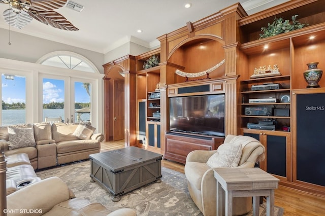 919 Ballinger Rd, Lutz, FL 33548 - living area featuring crown molding, a ceiling fan, wood finished floors, and recessed lighting