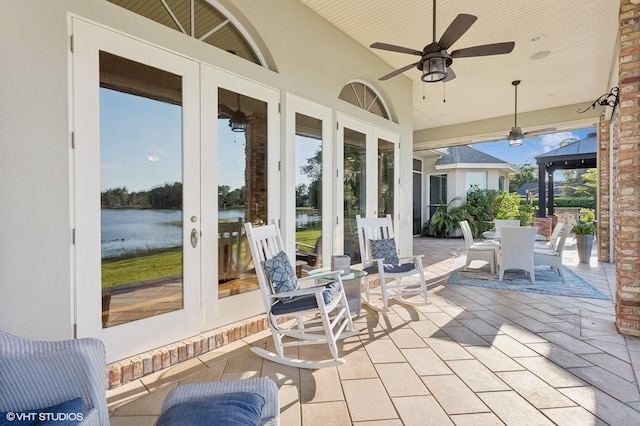 919 Ballinger Rd, Lutz, FL 33548 - view of patio / terrace with french doors, a water view, ceiling fan, and a gazebo