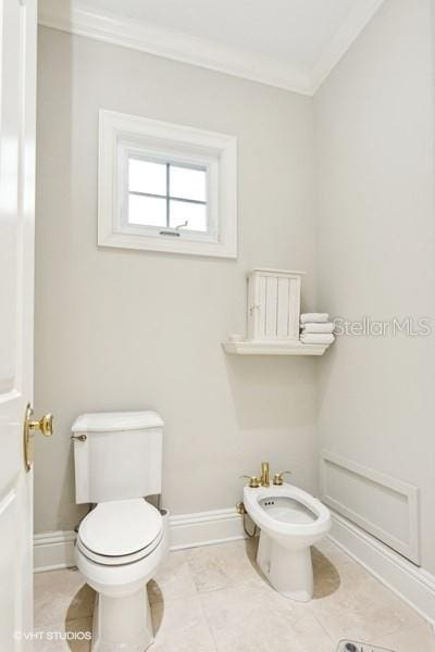 919 Ballinger Rd, Lutz, FL 33548 - bathroom featuring ornamental molding and a bidet