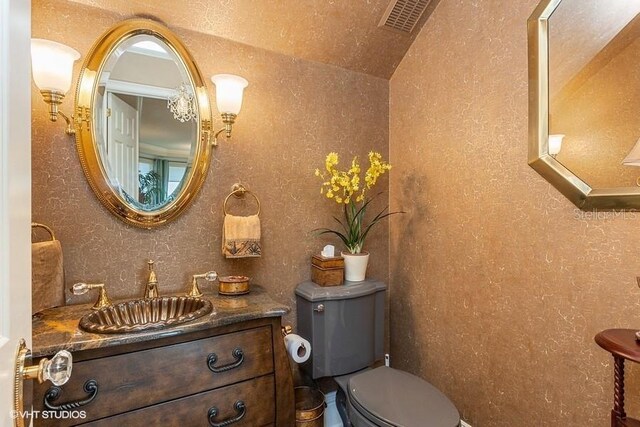 919 Ballinger Rd, Lutz, FL 33548 - bathroom with toilet and vanity
