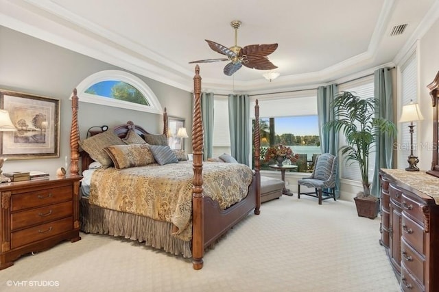 919 Ballinger Rd, Lutz, FL 33548 - bedroom with a tray ceiling, light colored carpet, ornamental molding, and ceiling fan