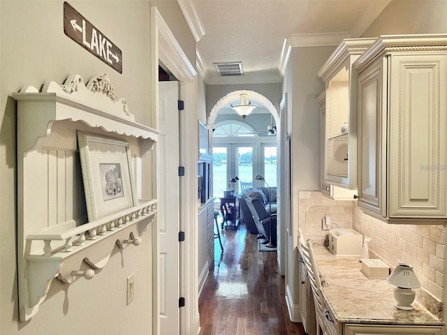 919 Ballinger Rd, Lutz, FL 33548 - hall with french doors, crown molding, and dark wood-style flooring