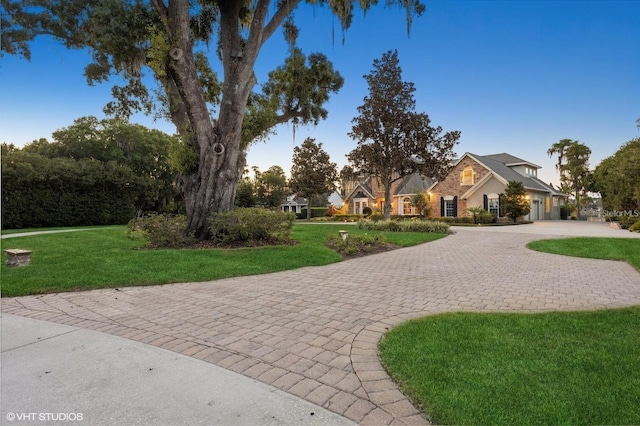 919 Ballinger Rd, Lutz, FL 33548 - view of front of property with curved driveway and a front lawn