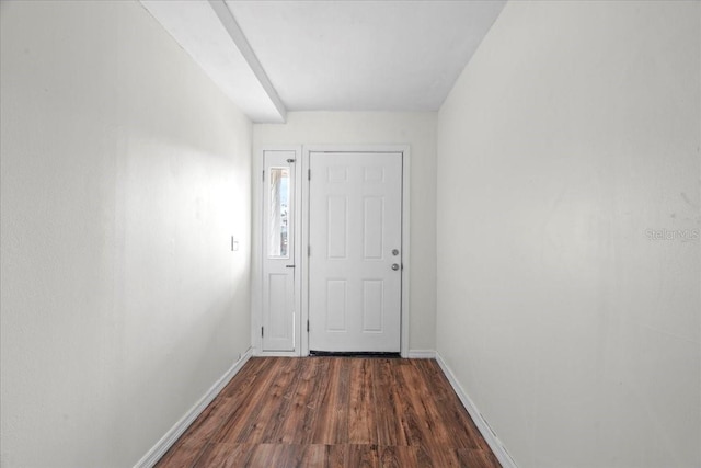 903 Tomahawk Trl, Brandon, FL 33511 - entryway with baseboards and wood finished floors