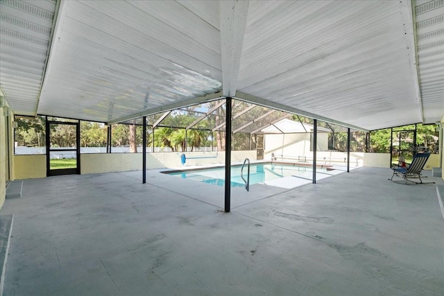 903 Tomahawk Trl, Brandon, FL 33511 - outdoor pool with a patio area and glass enclosure