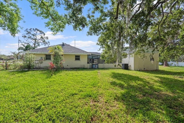 903 Tomahawk Trl, Brandon, FL 33511 - view of grassy yard with cooling unit
