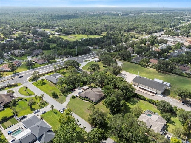 903 Tomahawk Trl, Brandon, FL 33511 - aerial overview of property's location featuring a heavily wooded area and nearby suburban area