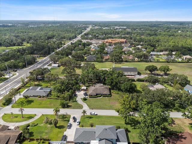903 Tomahawk Trl, Brandon, FL 33511 - aerial view of property and surrounding area with nearby suburban area and a heavily wooded area