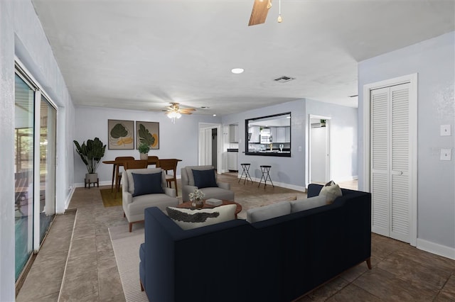 903 Tomahawk Trl, Brandon, FL 33511 - living room with ceiling fan and baseboards
