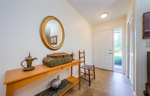 368 Perth Ct Unit 368, Dunedin, FL 34698 - entryway featuring a textured ceiling