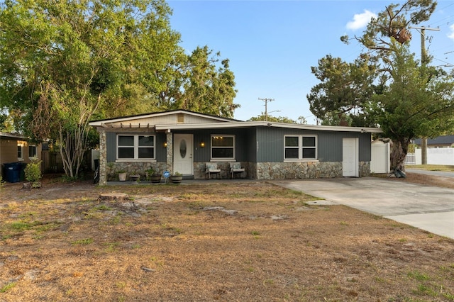 8001 N Ola Ave, Tampa, FL 33604 - view of front of home featuring stone siding