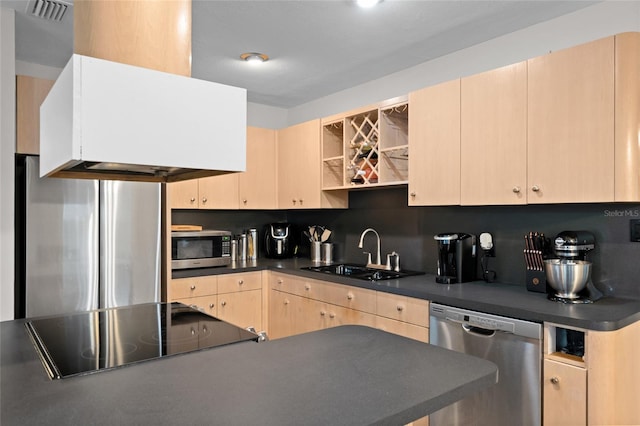 8001 N Ola Ave, Tampa, FL 33604 - kitchen featuring stainless steel appliances, a sink, dark countertops, light brown cabinets, and open shelves