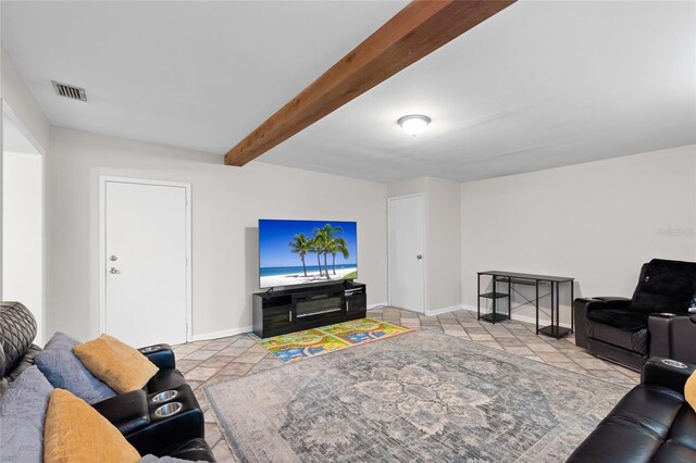 8001 N Ola Ave, Tampa, FL 33604 - living area with beamed ceiling, baseboards, and stone finish flooring