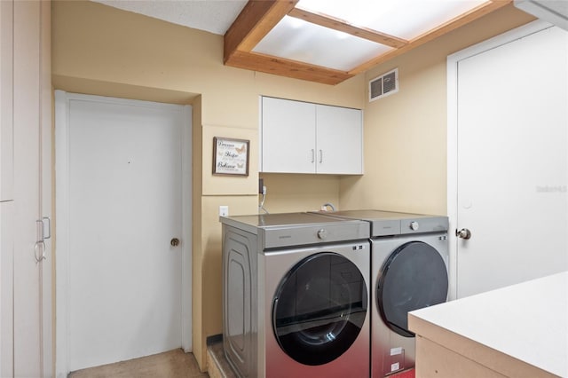 8001 N Ola Ave, Tampa, FL 33604 - washroom featuring independent washer and dryer, cabinet space, and light carpet