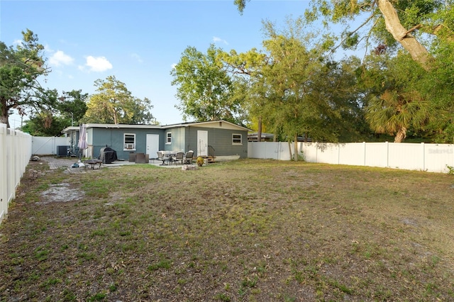 8001 N Ola Ave, Tampa, FL 33604 - view of yard featuring a patio and central air condition unit