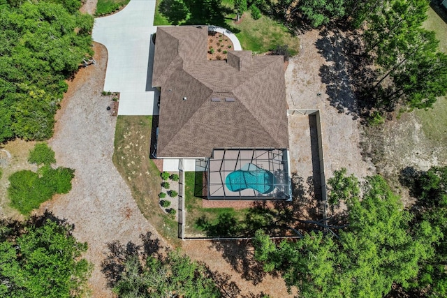 view of subject property with a pool area