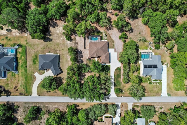 view of property location with a pool area
