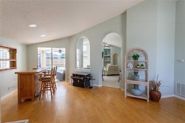 7838 Trail Run Loop, New Port Richey, FL 34653 - dining space with a ceiling fan, healthy amount of natural light, light wood finished floors, a textured ceiling, and recessed lighting