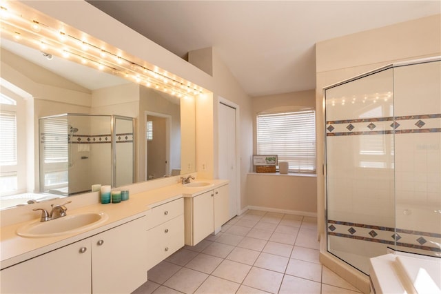 7838 Trail Run Loop, New Port Richey, FL 34653 - full bath featuring lofted ceiling, a shower stall, tile patterned flooring, a bath, and double vanity