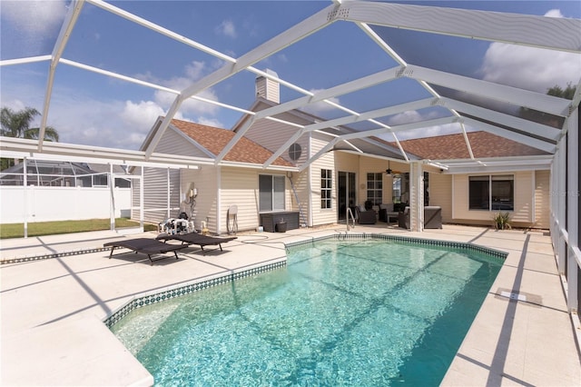 7838 Trail Run Loop, New Port Richey, FL 34653 - swimming pool featuring a patio area, an outdoor hangout area, glass enclosure, and ceiling fan