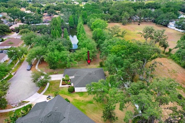 aerial view of property's location with nearby suburban area