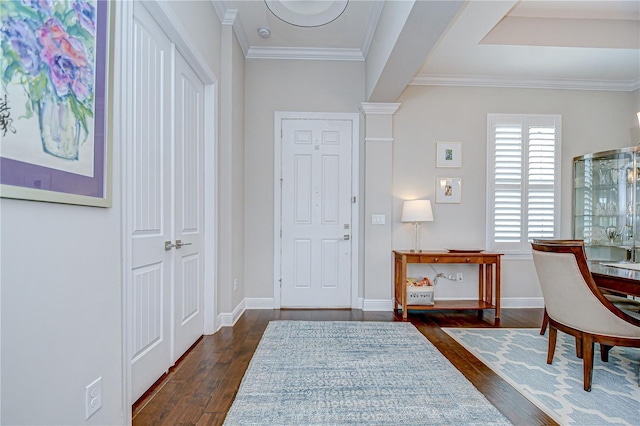 5728 Watercolor Dr, Lithia, FL 33547 - entrance foyer featuring dark wood finished floors, baseboards, and crown molding