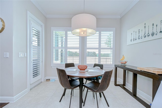 5728 Watercolor Dr, Lithia, FL 33547 - dining room featuring baseboards, light tile patterned floors, and crown molding