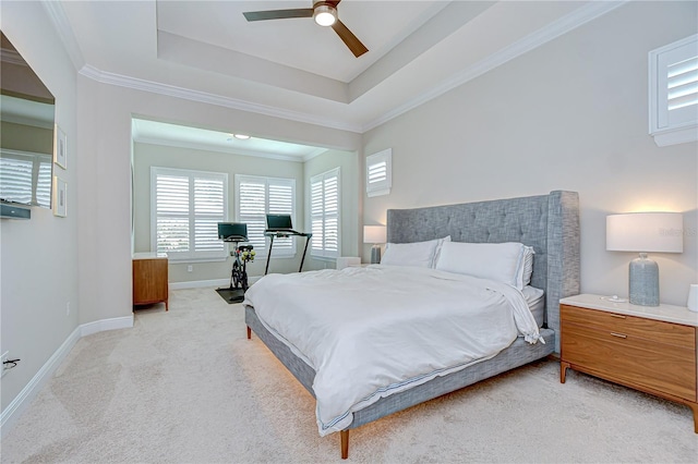 5728 Watercolor Dr, Lithia, FL 33547 - bedroom featuring multiple windows, light carpet, baseboards, a raised ceiling, and crown molding