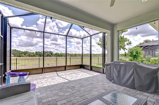 5728 Watercolor Dr, Lithia, FL 33547 - sunroom with ceiling fan