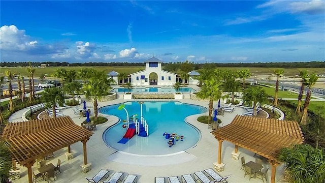 5728 Watercolor Dr, Lithia, FL 33547 - community pool with a patio