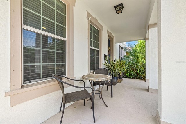 1436 30th Ave N, Saint Petersburg, FL 33704 - view of patio / terrace with a porch