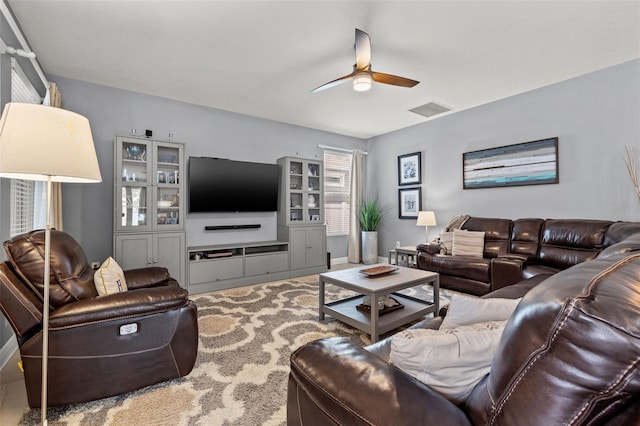 1436 30th Ave N, Saint Petersburg, FL 33704 - living room with ceiling fan and carpet floors