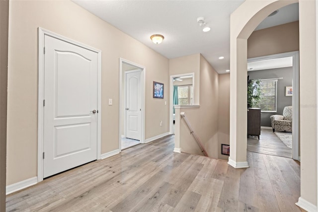 1436 30th Ave N, Saint Petersburg, FL 33704 - entrance foyer featuring healthy amount of natural light, wood finished floors, baseboards, and recessed lighting