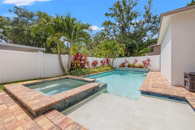 1436 30th Ave N, Saint Petersburg, FL 33704 - view of pool featuring a fenced backyard, a patio, and a pool with connected hot tub