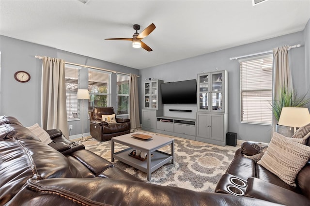 1436 30th Ave N, Saint Petersburg, FL 33704 - living room featuring ceiling fan and baseboards