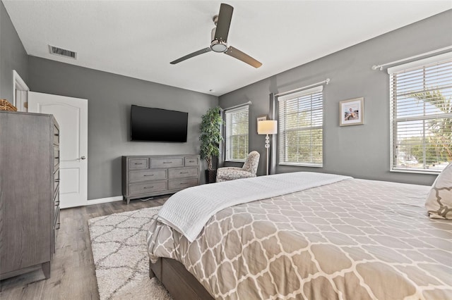1436 30th Ave N, Saint Petersburg, FL 33704 - bedroom with wood finished floors and a ceiling fan