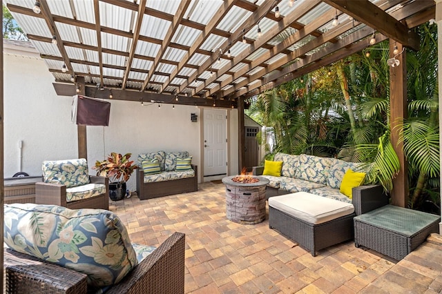 1436 30th Ave N, Saint Petersburg, FL 33704 - view of patio / terrace with an outdoor living space with a fire pit and a pergola