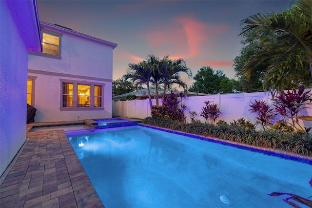1436 30th Ave N, Saint Petersburg, FL 33704 - view of pool with a fenced backyard and a pool with connected hot tub