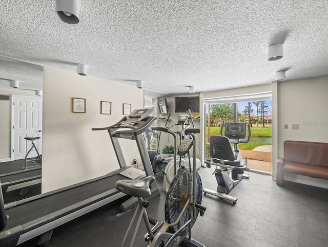 5700 Escondida Blvd S Unit 401, Saint Petersburg, FL 33715 - exercise area with a textured ceiling