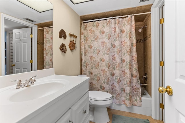 4900 Brittany Dr S Unit 209, Saint Petersburg, FL 33715 - full bathroom featuring shower / bath combination with curtain, vanity, and toilet