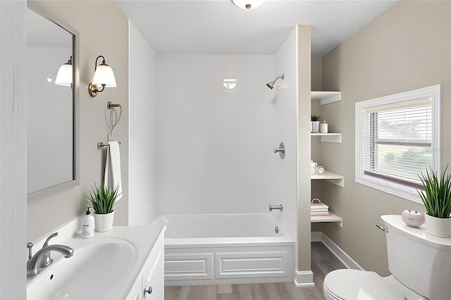 1101 Dr Martin L King Jr Way, Haines City, FL 33844 - full bath with toilet, wood finished floors, washtub / shower combination, and vanity