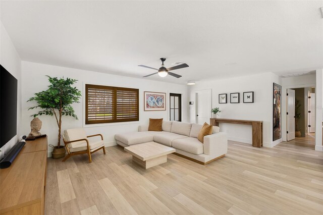 4618 Bayshore Blvd NE, Saint Petersburg, FL 33703 - living area featuring baseboards, light wood-style flooring, and ceiling fan