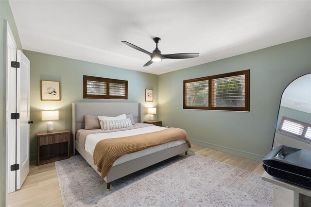 4618 Bayshore Blvd NE, Saint Petersburg, FL 33703 - bedroom with light wood finished floors, baseboards, and a ceiling fan