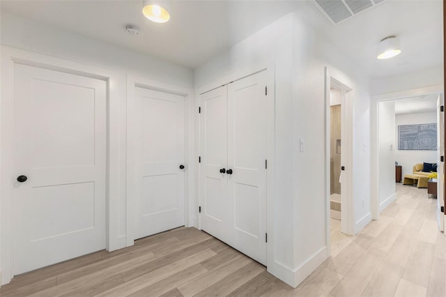 4618 Bayshore Blvd NE, Saint Petersburg, FL 33703 - corridor with light wood-style floors and baseboards