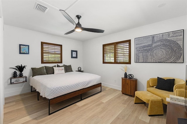 4618 Bayshore Blvd NE, Saint Petersburg, FL 33703 - bedroom with light wood-type flooring, multiple windows, and baseboards