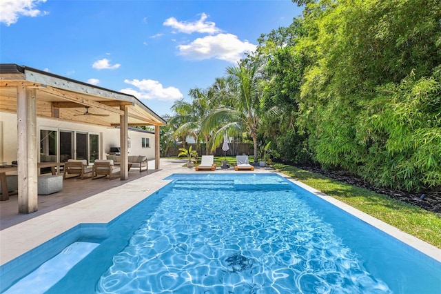 4618 Bayshore Blvd NE, Saint Petersburg, FL 33703 - outdoor pool with an outdoor living space, a patio, a fenced backyard, and a ceiling fan