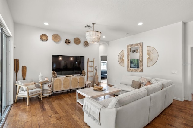 living area featuring hardwood / wood-style floors, recessed lighting, and baseboards