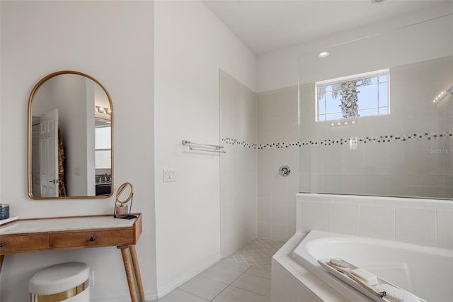 full bathroom featuring tile patterned floors, a garden tub, and a walk in shower